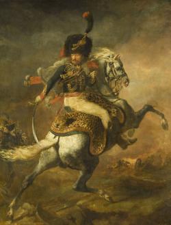 Officier de la garde de Napoléon sur un cheval blanc cabré chargeant avec un sabre